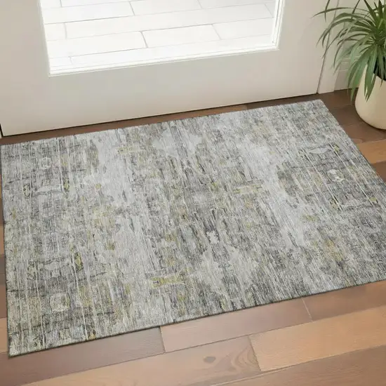 Gray Silver And Gold Abstract Washable Area Rug With UV Protection Photo 1