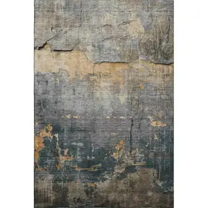 Photo of Gray Silver And Gold Abstract Washable Area Rug With UV Protection