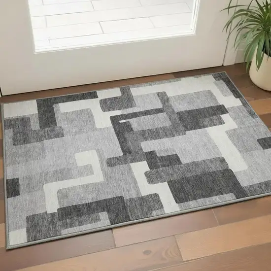 Gray Silver And Ivory Abstract Geometric Washable Area Rug With UV Protection Photo 2
