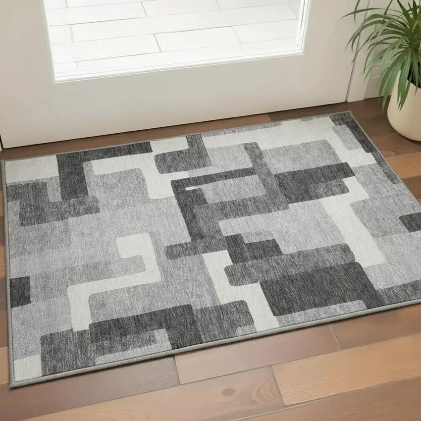 Gray Silver And Ivory Abstract Geometric Washable Area Rug With UV Protection Photo 2