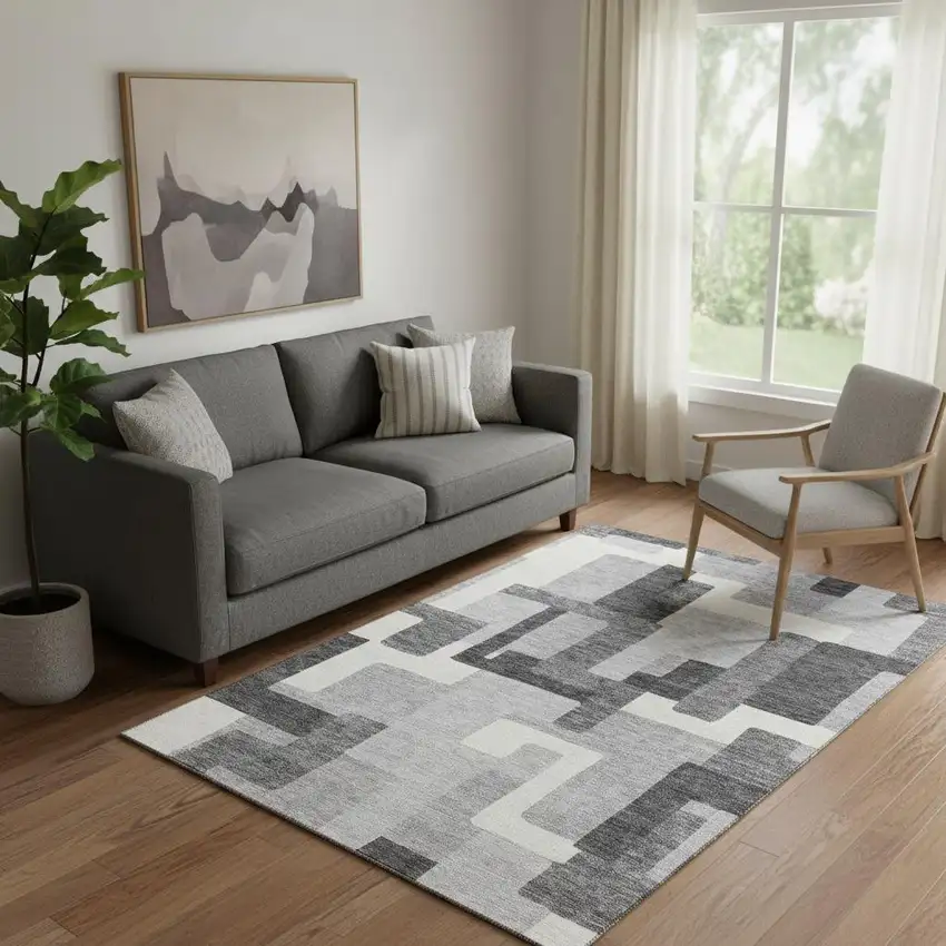 Gray Silver And Ivory Abstract Geometric Washable Area Rug With UV Protection Photo 1