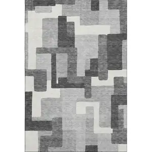 Photo of Gray Silver And Ivory Abstract Geometric Washable Area Rug With UV Protection