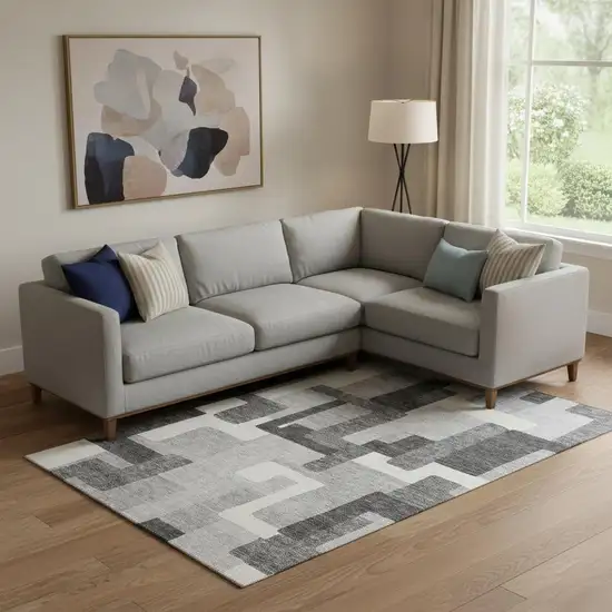 Gray Silver And Ivory Abstract Geometric Washable Area Rug With UV Protection Photo 1
