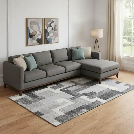 Gray Silver And Ivory Abstract Geometric Washable Area Rug With UV Protection Photo 1