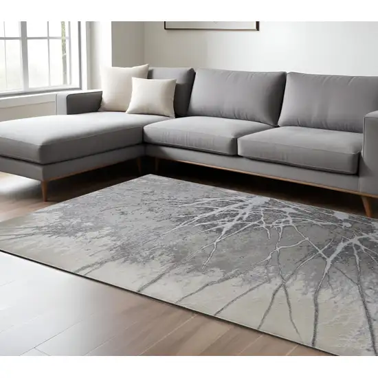 Gray Silver And Ivory Abstract Power Loom Area Rug Photo 1