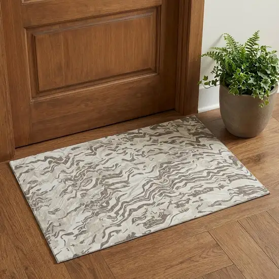 Gray Silver And Ivory Abstract Washable Area Rug With UV Protection Photo 1