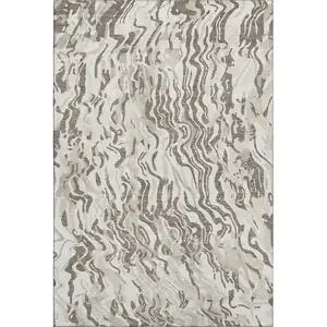 Photo of Gray Silver And Ivory Abstract Washable Area Rug With UV Protection