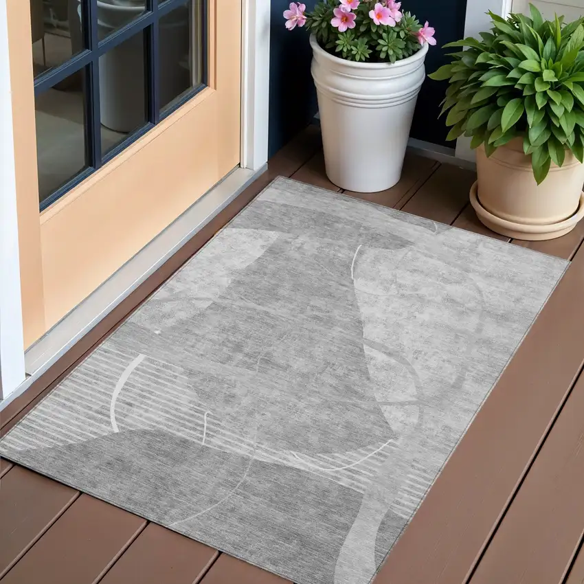 Gray Silver And Ivory Abstract Washable Indoor Outdoor Area Rug Photo 1