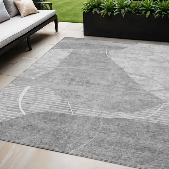 Gray Silver And Ivory Abstract Washable Indoor Outdoor Area Rug Photo 1