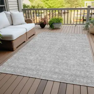 Photo of Gray Silver And Ivory Floral Washable Indoor Outdoor Area Rug
