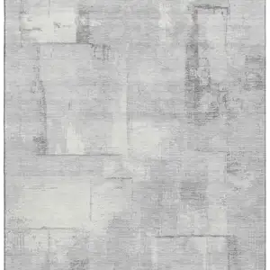 Photo of Gray Silver And Ivory Geometric Washable Area Rug With UV Protection