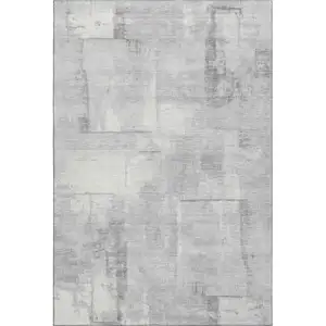 Photo of Gray Silver And Ivory Geometric Washable Area Rug With UV Protection