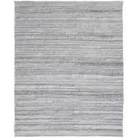Photo of Gray Silver And Ivory Striped Hand Woven Stain Resistant Area Rug