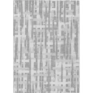 Photo of Gray Silver And Ivory Striped Washable Indoor Outdoor Area Rug