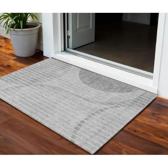 Gray Silver And Ivory Striped Washable Indoor Outdoor Area Rug Photo 1