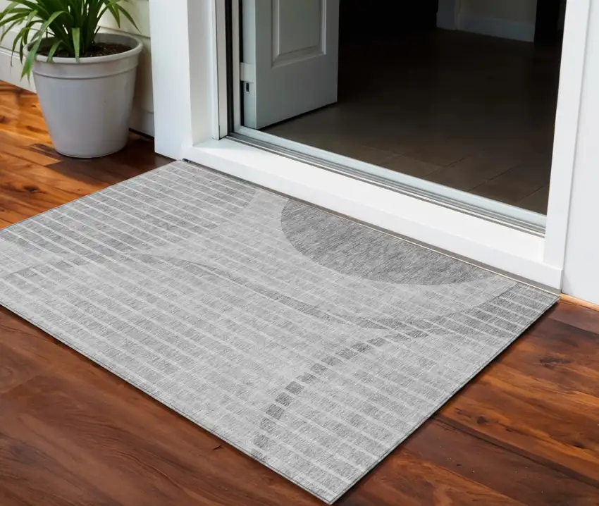 Gray Silver And Ivory Striped Washable Indoor Outdoor Area Rug Photo 1