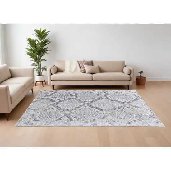 Gray Silver and Blue Floral Power Loom Area Rug Photo 1