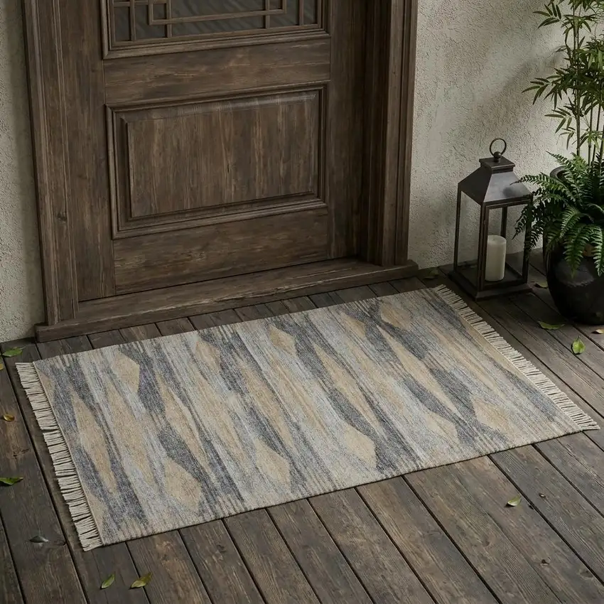 4' X 6' Gray Black And Brown Abstract Hand Woven Area Rug With Fringe Photo 1