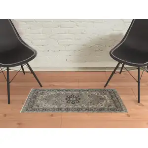 Photo of Gray Taupe And Blue Wool Floral Hand Knotted Stain Resistant Area Rug