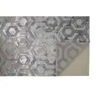 Photo of Gray Taupe And Silver Abstract Area Rug