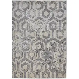 Photo of Gray Taupe And Silver Abstract Stain Resistant Area Rug