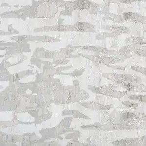 Photo of Gray Taupe And Silver Abstract Tufted Handmade Area Rug