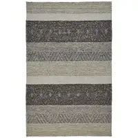 Photo of Gray Taupe And Tan Wool Floral Hand Woven Stain Resistant Area Rug