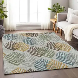 Photo of Gray Teal And Gold Floral Washable Area Rug With UV Protection