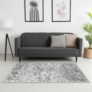 Photo of Gray White And Brown Abstract Washable Area Rug With UV Protection
