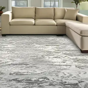 Photo of Gray White And Brown Abstract Washable Area Rug With UV Protection