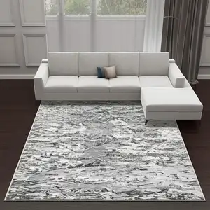 Photo of Gray White And Brown Abstract Washable Area Rug With UV Protection