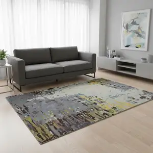 Photo of Gray Yellow And Black Abstract Hand Tufted Area Rug