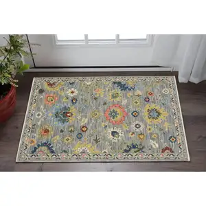 Photo of Gray Yellow And Blue Oriental Area Rug With Fringe