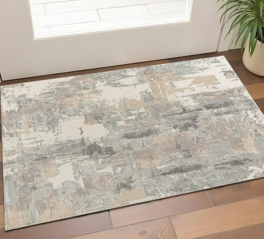 Beige Ivory And Gray Abstract Area Rug Photo 1