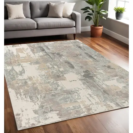 Beige Ivory And Gray Abstract Area Rug Photo 1