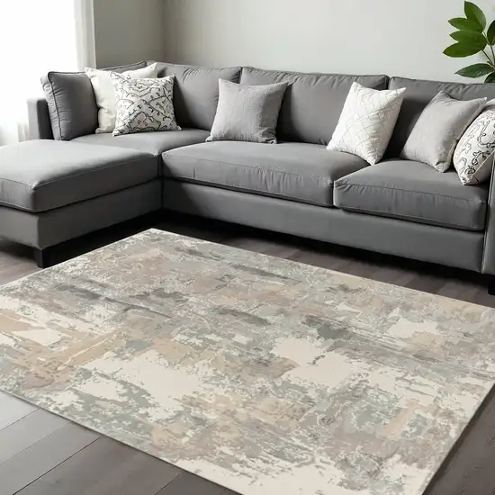 Beige Ivory And Gray Abstract Area Rug Photo 1