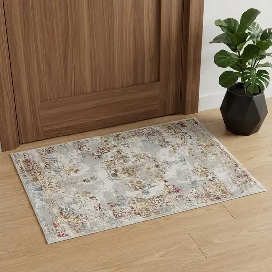 Gray And Beige Distressed Ornate Area Rug Photo 1