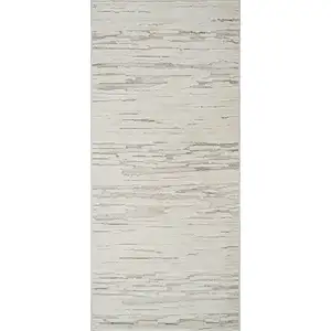 Photo of Gray and Beige Geometric Distressed Area Rug