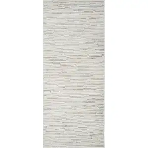 Photo of Gray and Beige Geometric Distressed Area Rug