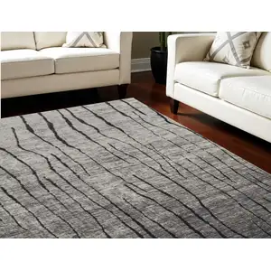 Photo of Gray and Black Abstract Power Loom Area Rug