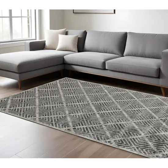 Gray and Black Geometric Power Loom Worn Faded Area Rug Photo 1