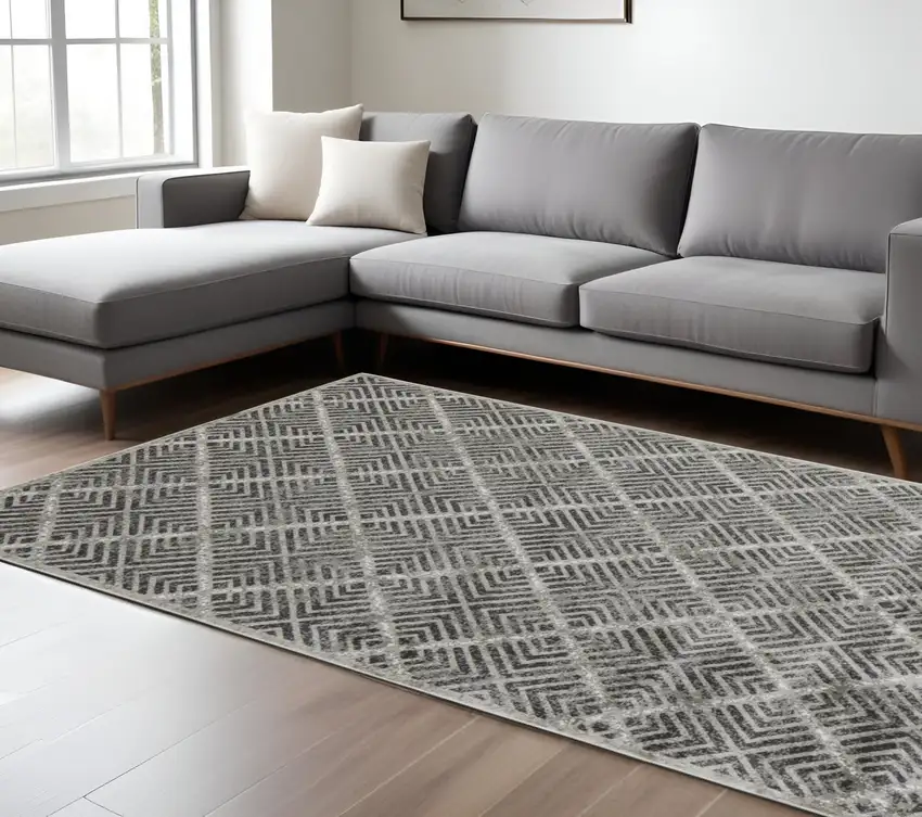 Gray and Black Geometric Power Loom Worn Faded Area Rug Photo 1