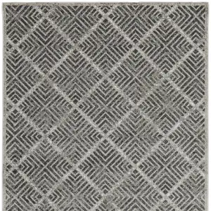 Photo of Gray and Black Geometric Power Loom Worn Faded Area Rug