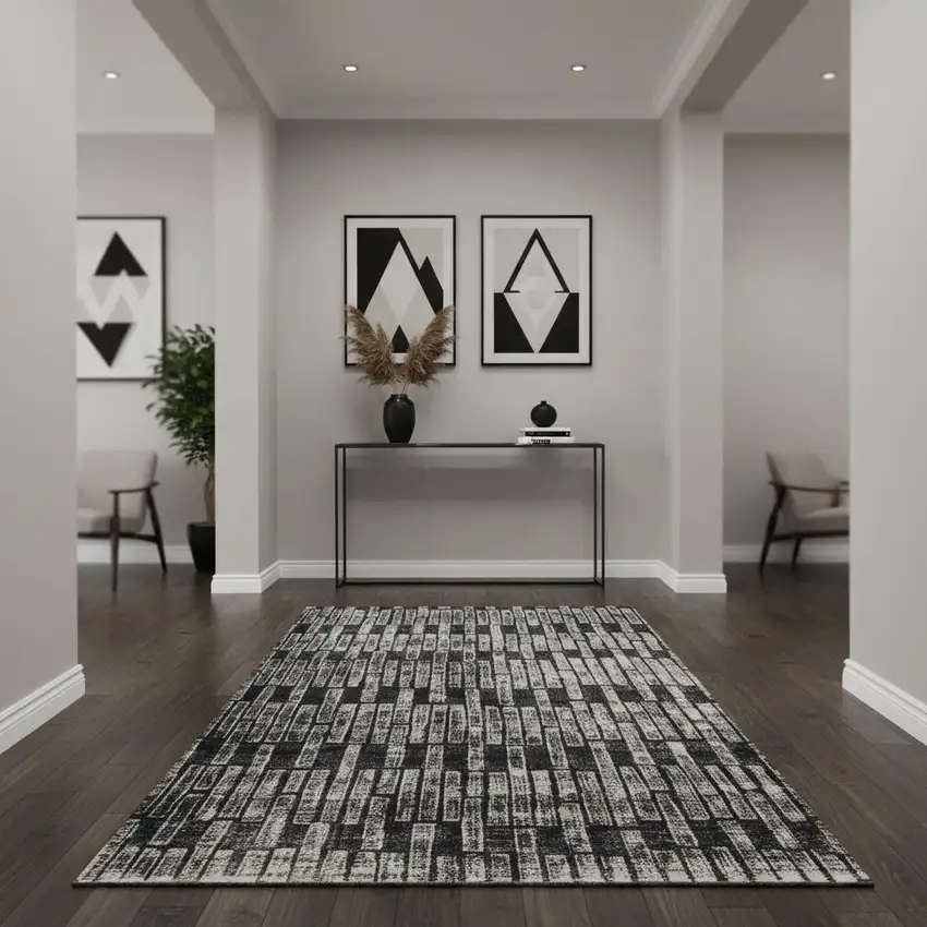 Gray and Black Geometric Power Loom Worn Faded Area Rug Photo 1