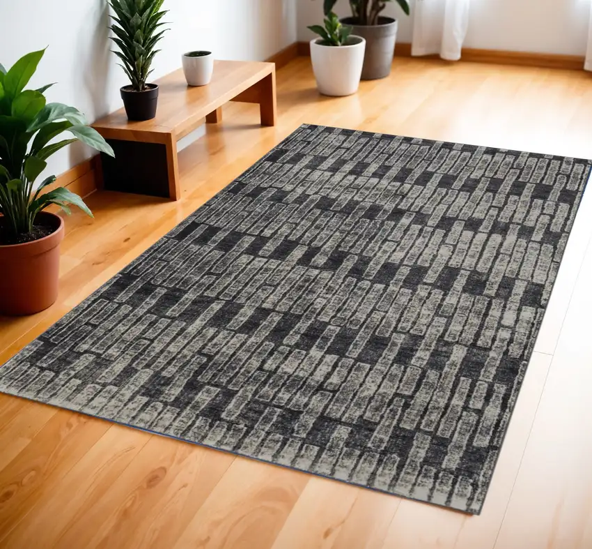 Gray and Black Geometric Power Loom Worn Faded Area Rug Photo 1