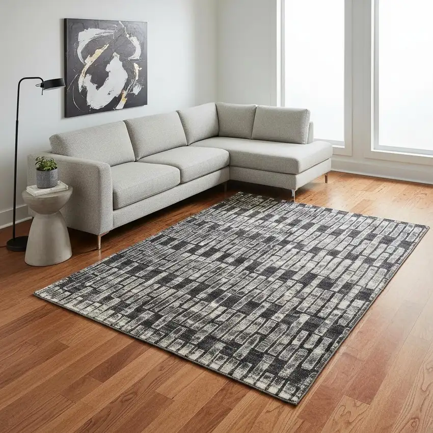 Gray and Black Geometric Power Loom Worn Faded Area Rug Photo 1