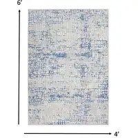 Photo of Gray and Blue Abstract Grids Area Rug