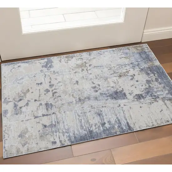Ivory Gray And Blue Abstract Distressed Area Rug Photo 1