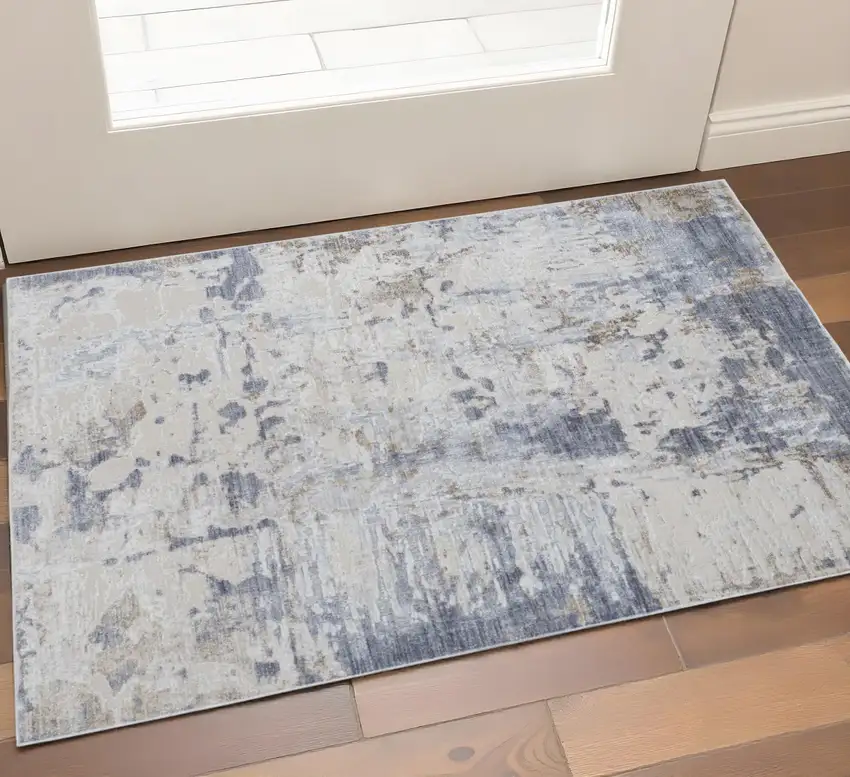 Ivory Gray And Blue Abstract Distressed Area Rug Photo 1