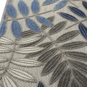 Photo of Gray and Blue Leaves Indoor Outdoor Area Rug